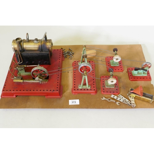 326 - A Mamod steam driven workshop, mounted on a wood board, 60 x 35cm