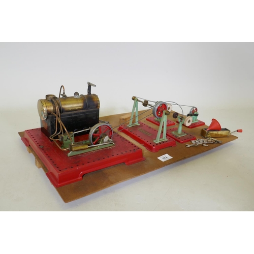 326 - A Mamod steam driven workshop, mounted on a wood board, 60 x 35cm