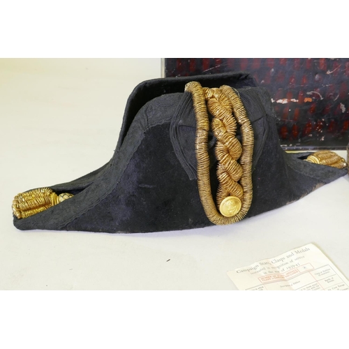 1 - A Royal Navy ship's officer's dress uniform, hat, sword, belt and epaulettes belonging to Surgeon Co... 