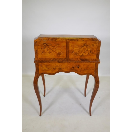 1001 - A rosewood marquetry inlaid bureau, with shaped top and cylinder front, the interior fitted with thr... 