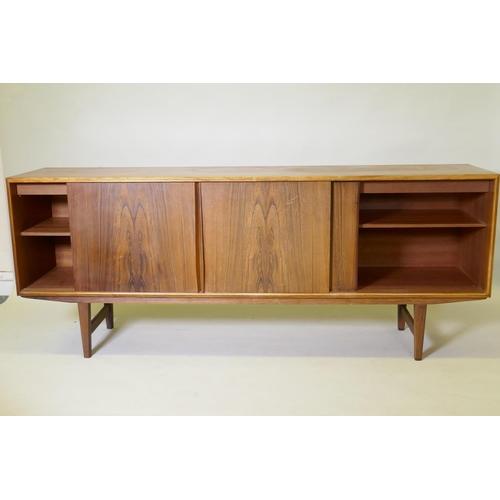 1008 - A mid century Danish sideboard, designed by E.W. Bach for Sejling Skaed Silkeborg, four sliding door... 