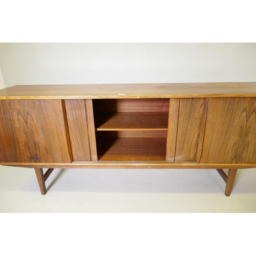 1008 - A mid century Danish sideboard, designed by E.W. Bach for Sejling Skaed Silkeborg, four sliding door... 