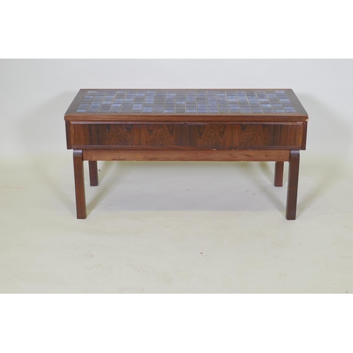 1026 - A mid century rosewood two drawer side table, with inset tile top, 92 x 42 x 44cm