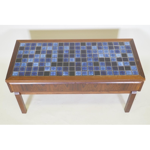 1026 - A mid century rosewood two drawer side table, with inset tile top, 92 x 42 x 44cm