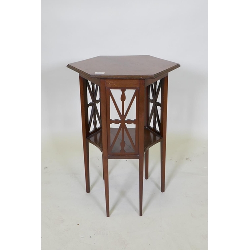 1031 - An Edwardian mahogany two tier occasional table with a hexagonal top an tapered legs, 52 x 46cm, 69c... 