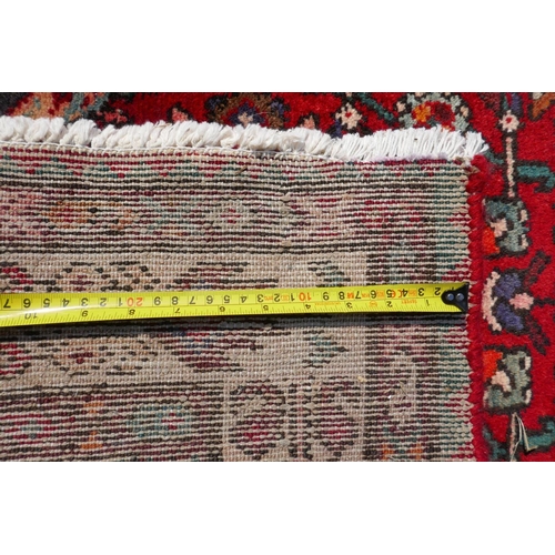 1033 - A rich red ground full heavy pile Iranian runner, AF, 104 x 365cm