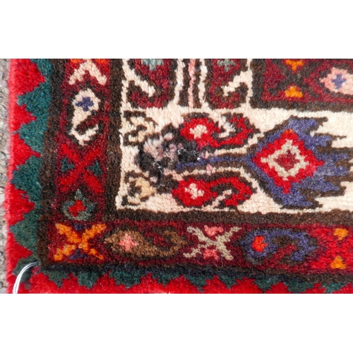 1033 - A rich red ground full heavy pile Iranian runner, AF, 104 x 365cm