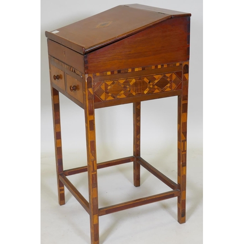 1035 - An antique parquetry inlaid child's bureau, with two drawers and a fitted interior, adapted, 44 x 40... 