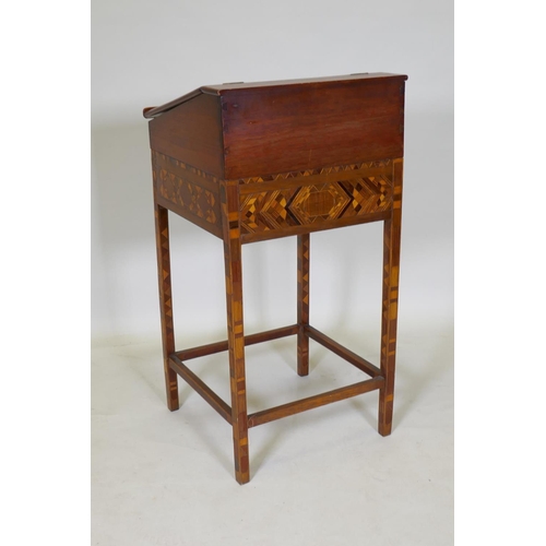 1035 - An antique parquetry inlaid child's bureau, with two drawers and a fitted interior, adapted, 44 x 40... 