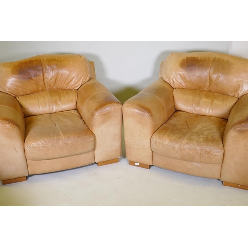 1037 - A pair of contemporary leather easy chairs