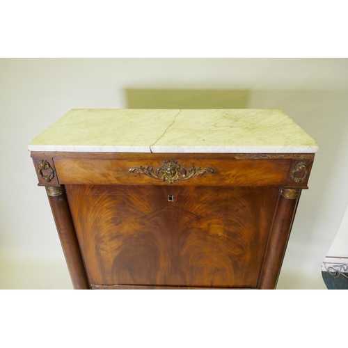 1041 - A C19th continental figured mahogany secretaire a abattant with ormolu mounts and marble top over si... 