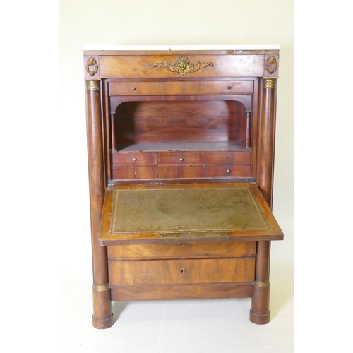 1041 - A C19th continental figured mahogany secretaire a abattant with ormolu mounts and marble top over si... 