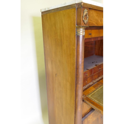 1041 - A C19th continental figured mahogany secretaire a abattant with ormolu mounts and marble top over si... 