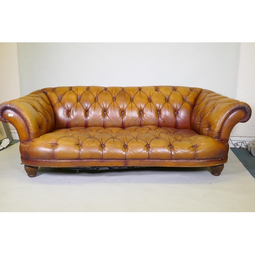 1045 - A Tetrad button leather Chesterfield style sofa, 2109cm wide