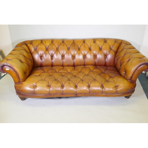 1045 - A Tetrad button leather Chesterfield style sofa, 2109cm wide