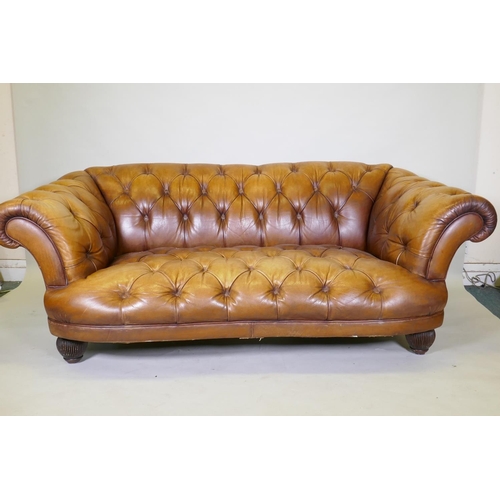 1046 - A Tetrad button leather Chesterfield style sofa, 2109cm wide