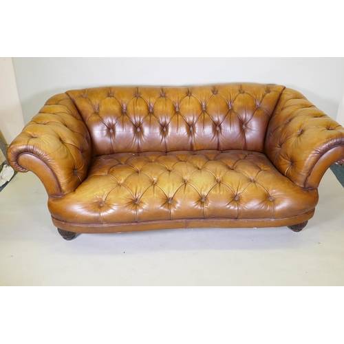 1046 - A Tetrad button leather Chesterfield style sofa, 2109cm wide