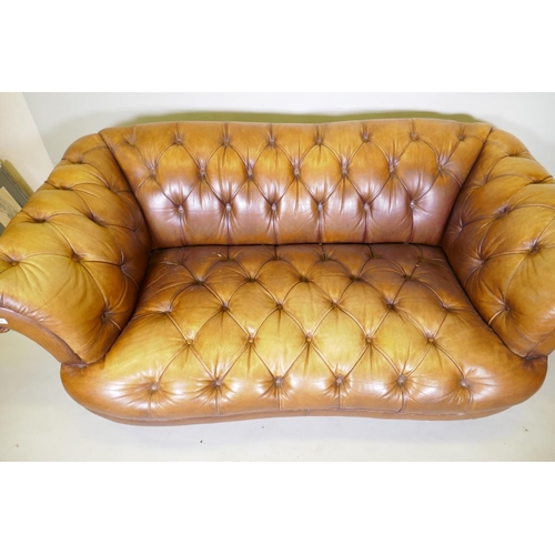 1046 - A Tetrad button leather Chesterfield style sofa, 2109cm wide