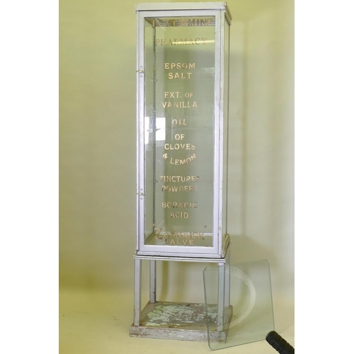 1048 - A mid century glass display cabinet on stand with painted decoration, 57 x 58cm, 218cm high