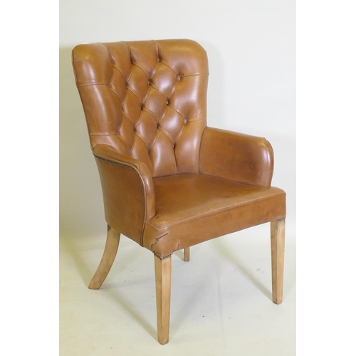 1050 - A leather button back desk chair, AF