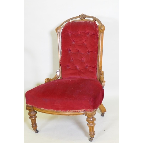 1053 - A Victorian carved walnut nursing chair, AF, and a C19th beechwood and elm open arm chair