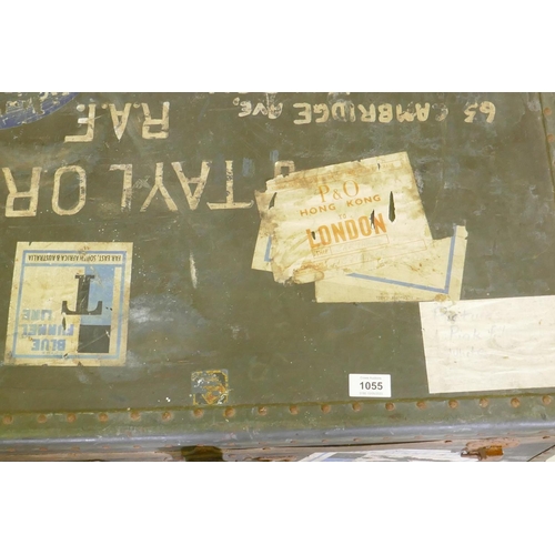 1055 - A vintage metal strapped travel trunk adorned with various cabin labels, together with a large metal... 