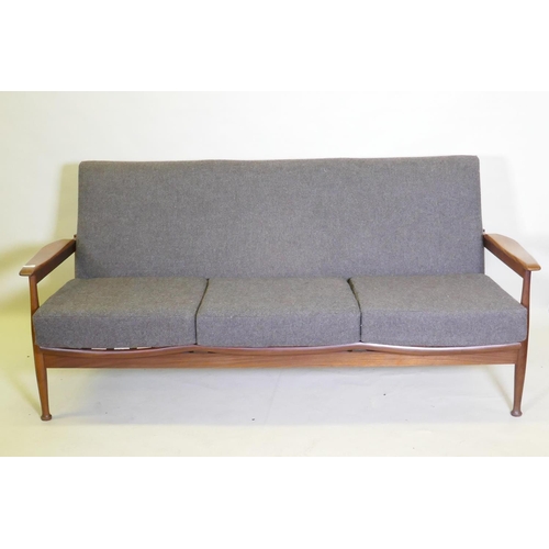 1056 - A mid century afrormosia Manhattan three seater settee designed by George Fejer and Eric Pamphilon f... 