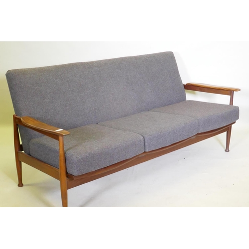 1056 - A mid century afrormosia Manhattan three seater settee designed by George Fejer and Eric Pamphilon f... 