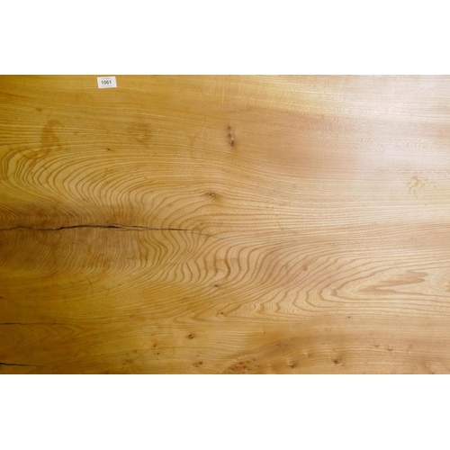 1061 - A large elm wood plank table top, 238 x 91cm