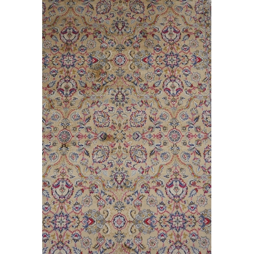 1065 - A gold ground full pile Kashmir rug with floral medallion design, 156 x 230cm