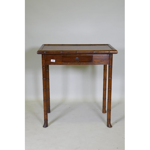 1068 - A faux bamboo side table with a single drawer, 75 x 50cm, 78cm high