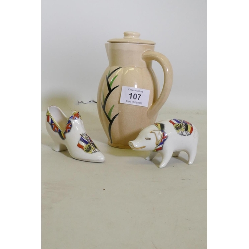107 - An Ashtead Pottery jug and cover, c1928, with reed decoration on a pearl barley ground, a Corona Cre... 