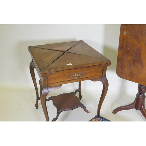 1074 - A Victorian inlaid mahogany envelope card table, 56 x 56 x 72cm, a Regency mahogany tilt top table, ... 