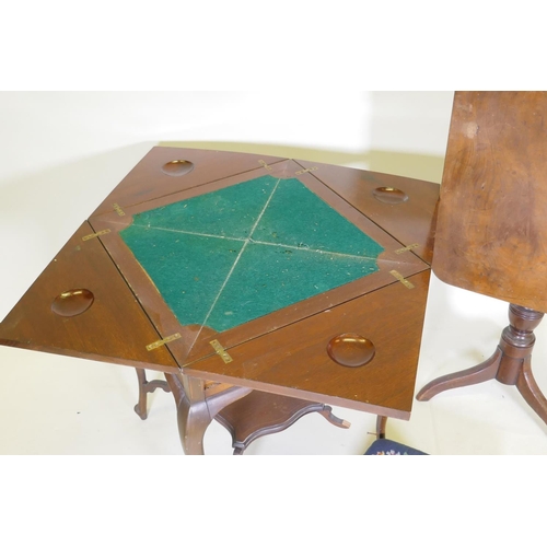 1074 - A Victorian inlaid mahogany envelope card table, 56 x 56 x 72cm, a Regency mahogany tilt top table, ... 