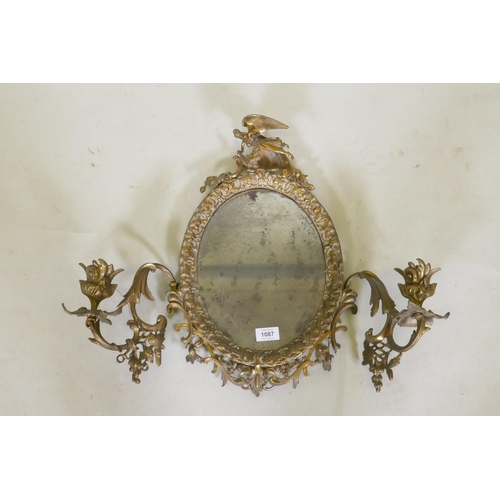 1087 - A C19th ormolu brass two branch girondelle, with original distressed silvered glass, 49cm high