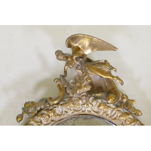 1087 - A C19th ormolu brass two branch girondelle, with original distressed silvered glass, 49cm high