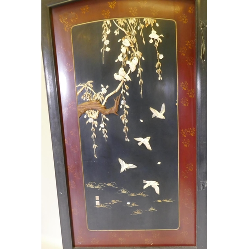 1092 - A Meiji period two fold lacquer screen, with raised decoration of birds and blossom in bone, mother ... 