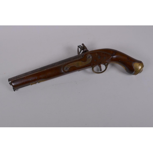 110 - A late C18th/early C19th flintlock pistol, barrel 23cm long, the lock stamped Tower on a crown over ... 