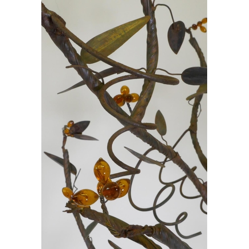 1102 - A wrought iron tree with amber glass blossoms, 156cm high