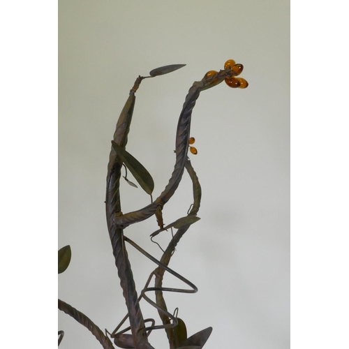 1102 - A wrought iron tree with amber glass blossoms, 156cm high