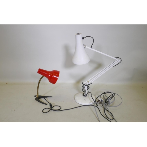 113 - An industrial multi poseable desk lamp with a red enamel shade, together with a white angle poise st... 