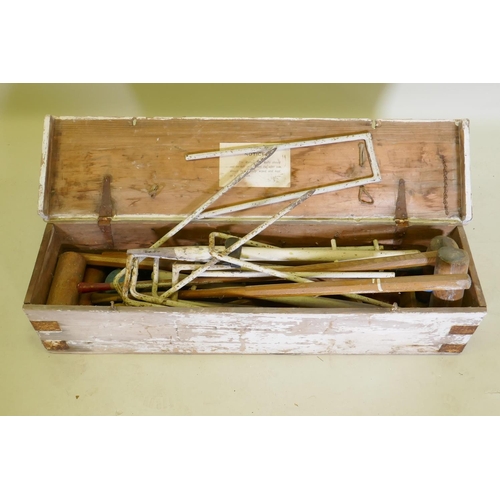 119 - An antique croquet set, appears complete, boxed