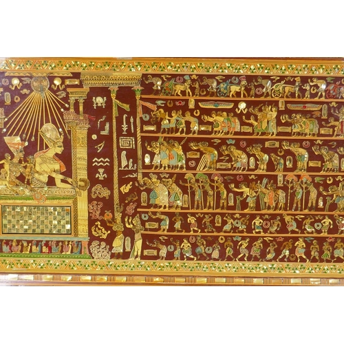 129 - An Egyptian mother of pearl inlaid panel depicting ancient Egyptian scenes, circa mid C20th, minor l... 