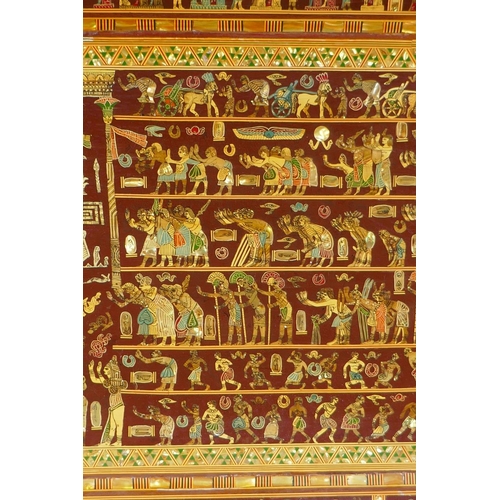 129 - An Egyptian mother of pearl inlaid panel depicting ancient Egyptian scenes, circa mid C20th, minor l... 