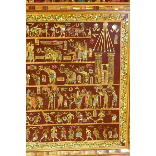 129 - An Egyptian mother of pearl inlaid panel depicting ancient Egyptian scenes, circa mid C20th, minor l... 