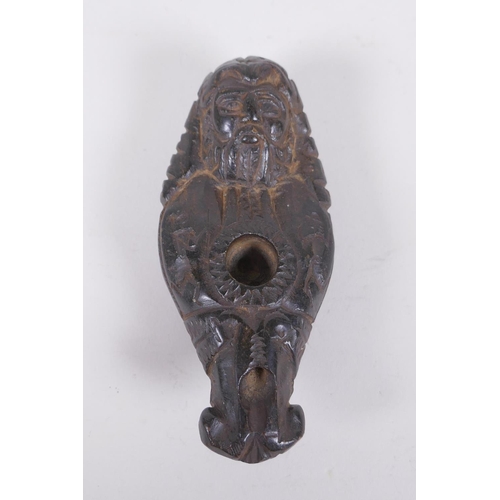 131 - An antique Syrian carved hardstone figural oil lamp, 12cm long