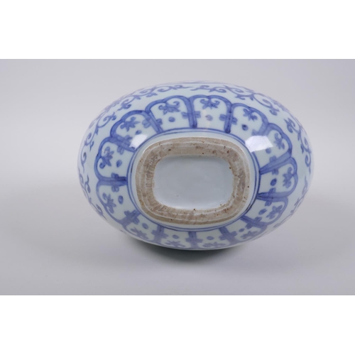 140 - A Chinese blue and white moon flask, with decorative panels bearing inscriptions, Zhengde 6 characte... 