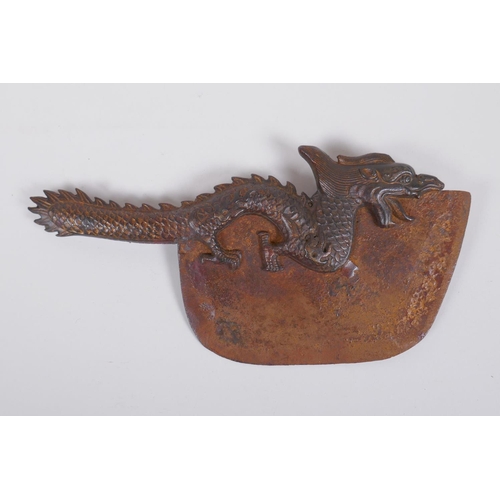 153 - A Tibetan bronze ritual chopper with dragon form handle, 33cm long