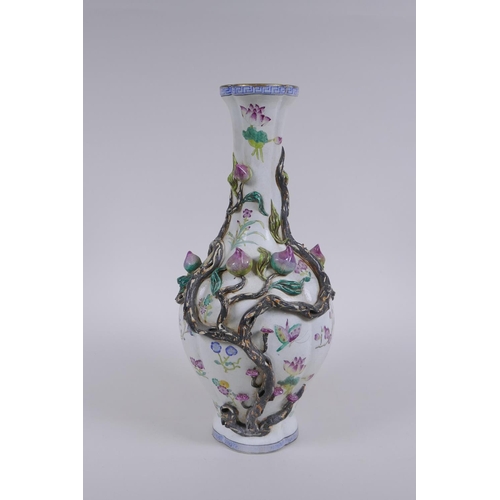 158 - A famille rose porcelain vase with applied peach tree decoration, Chinese Qianlong seal mark to base... 