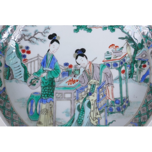 168 - A famille vert porcelain charger decorated with women painting, Chinese KangXi 6 character mark to b... 